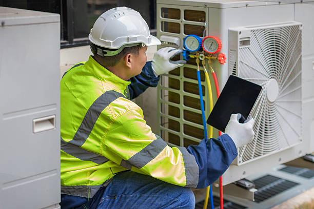 Professional Air Duct Cleaning technician working in Highland Park, MI